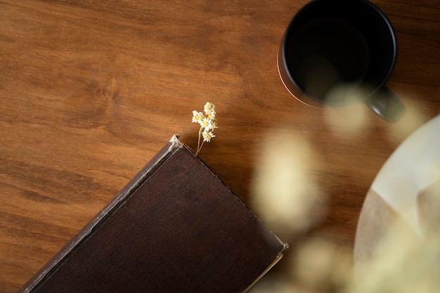 Top view book with flower bookmark