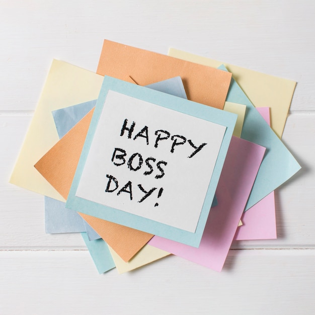 Free Photo top view boss's day arrangement with sticky notes