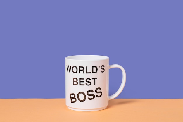 Top view boss's day arrangement with world's best boss cup