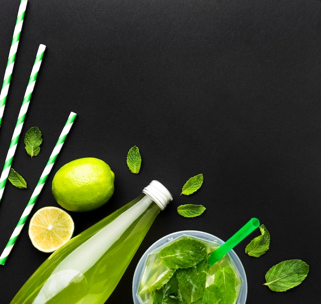 Free photo top view of bottle with soft drink and glass