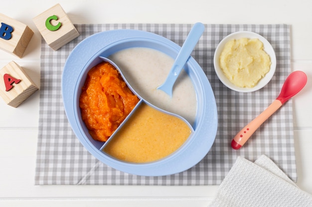 Top view bowl with baby food