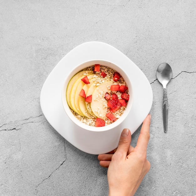 Top view bowl with fruits and cereals