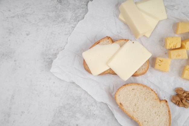 Top view bread slices with cheese on top