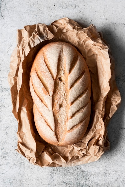 Top view bread with decoration on parchment paper