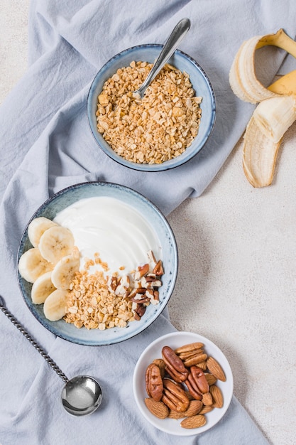 Top view breakfast bowl with oats and fruits