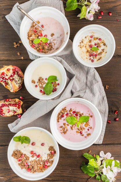 Top view breakfast bowls with organic fruit