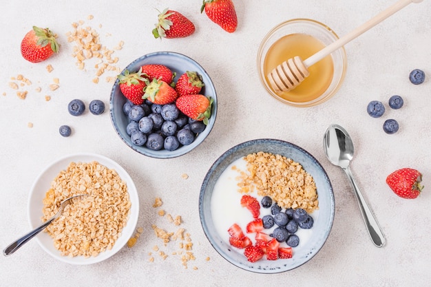 Top view breakfast with cereals and fruits