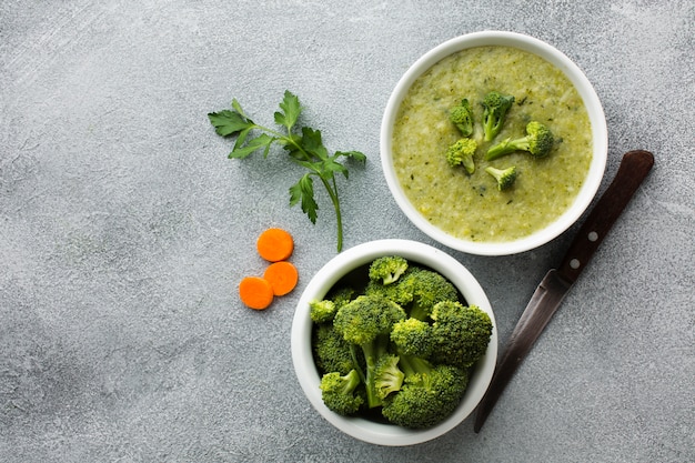 Free Photo top view broccoli and carrots bisque with copy space