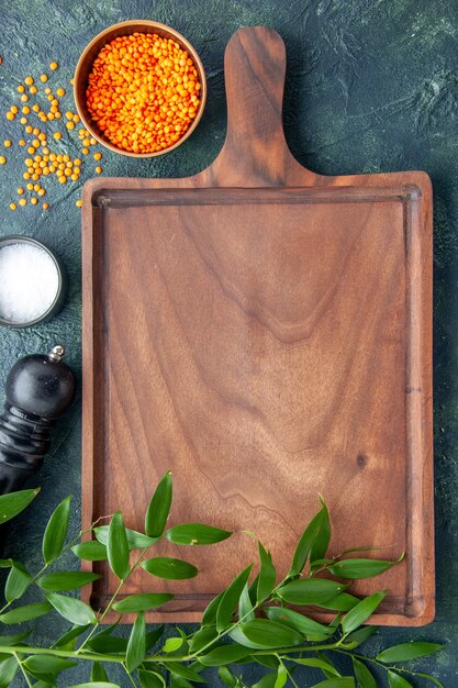 Top view brown wooden desk on dark blue surface ancient cuisine meat butcher kitchen knife food