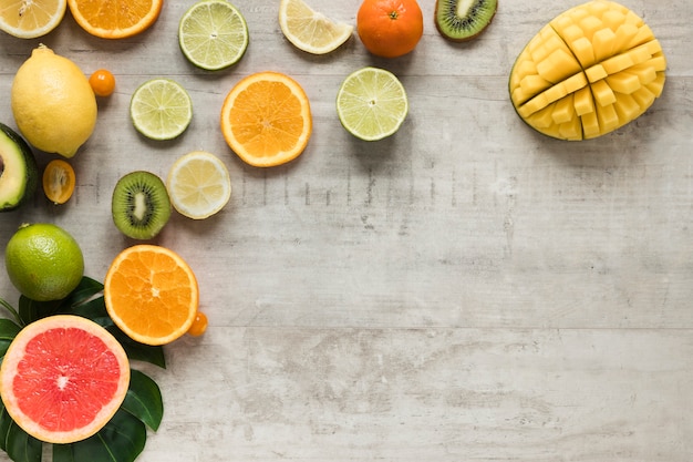 Top view bunch of exotic and fresh fruits with copy space