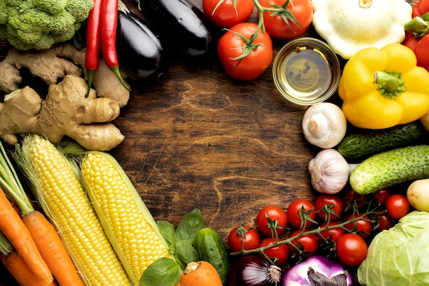 Free photo top view bunch of fresh vegetables composition