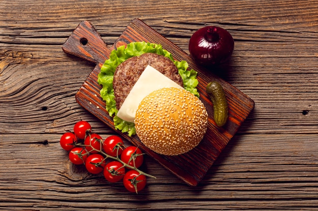 Top view burger ingredients on cutting board