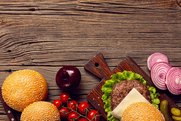 Free Photo top view burger on wooden table