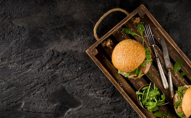 Free Photo top view burgers in basket with copy-space