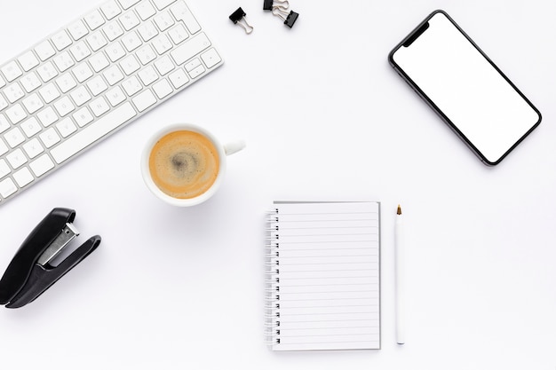 Top view business desk arrangement  on white background