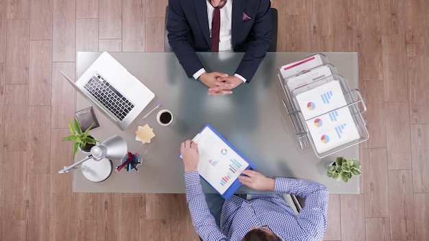 Free photo top view of businessman analyzing financial documents discussing company strategy