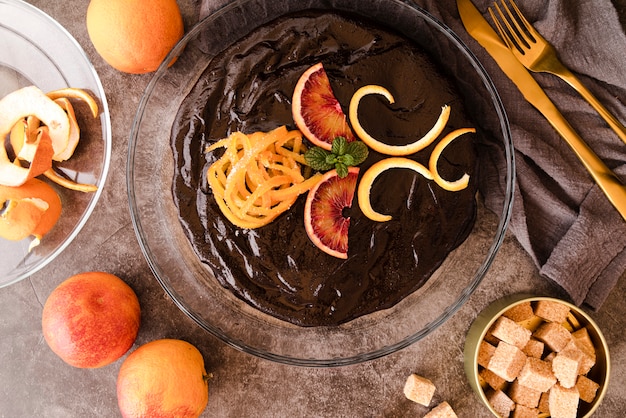 Top view of cake with sugar cubes and fruit