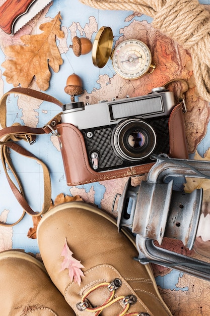 Free photo top view of camera and autumn essentials