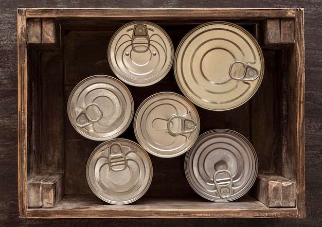 Top view cans in wooden crate