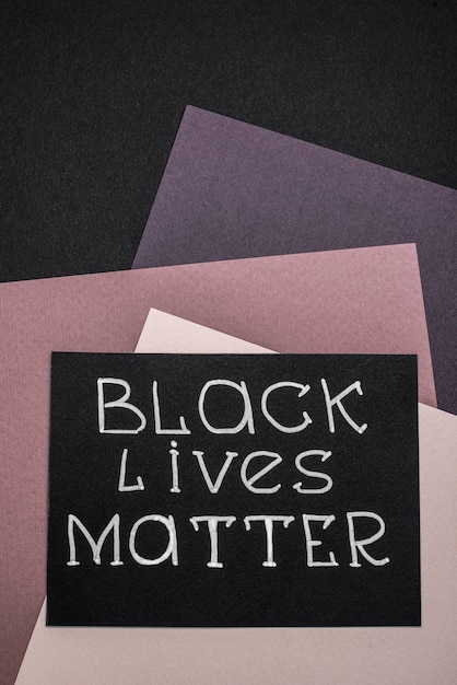 Free photo top view of card with black lives matter on multicolored paper