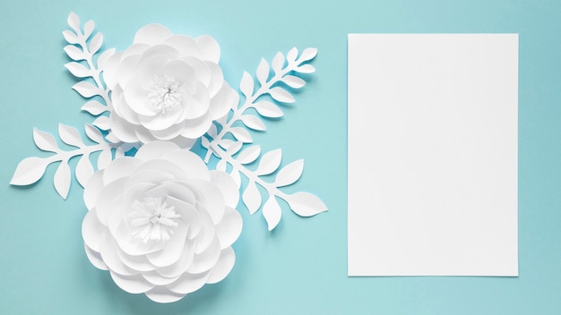 Free photo top view of card with paper flowers for women's day