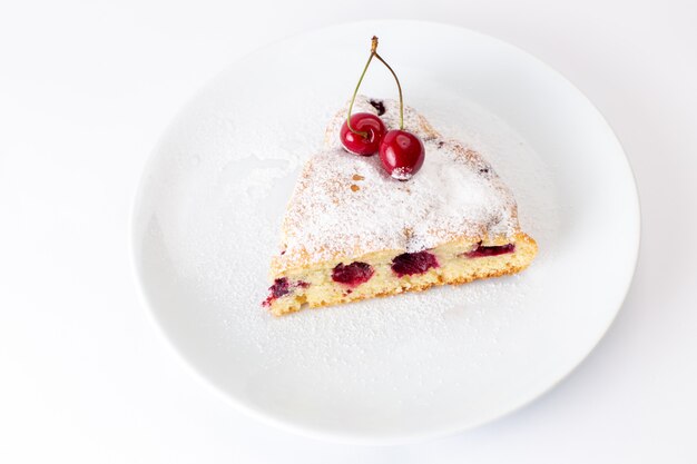 Free Photo top view cherry cake slice inside white plate with sugar powder on the white background cake sweet sugar dough bake