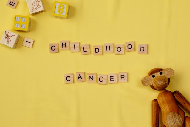 Top view over childhood cancer awareness month background concepttoys,