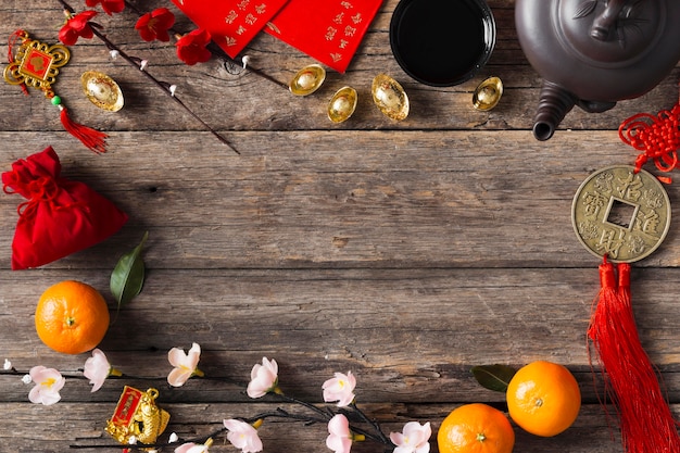 Top view of chinese new year concept on wooden table