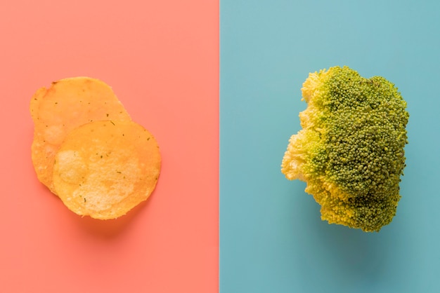 Top view chips and broccoli