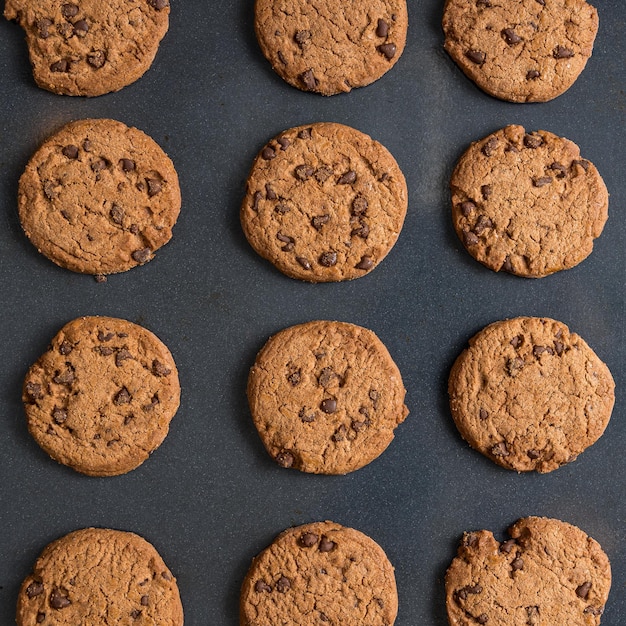 Free Photo top view of chocolate chip cookies on a baking pan