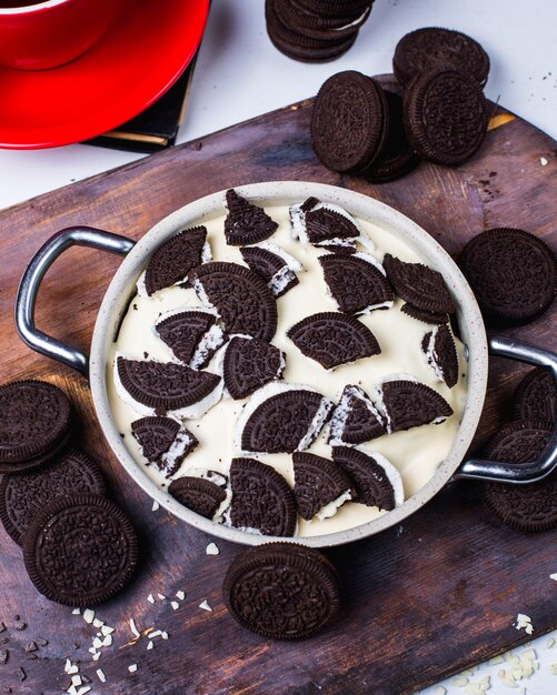 Top view of chocolate cookie with cream filling in a pan