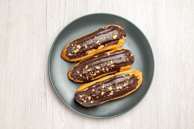 Top view of chocolate eclairs sweets