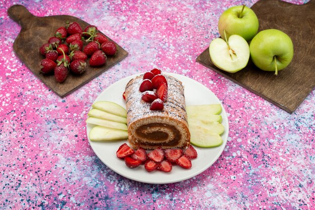 Top view chocolate roll cake with fruits inside plate on the purple floor cake biscuit sugar sweet