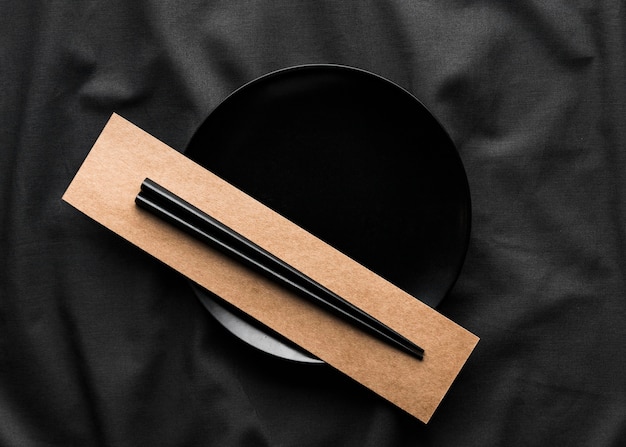 Top view of chopsticks on plate