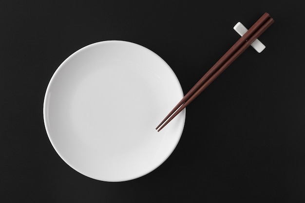 Top view over chopsticks with bowl