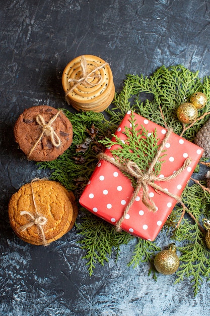 Top view christmas present with different biscuits