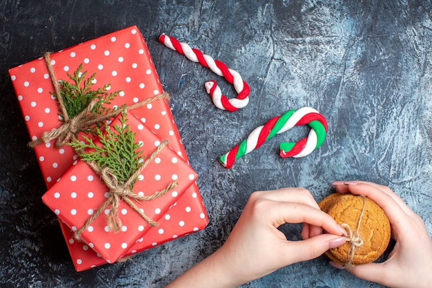 Top view christmas presents with biscuits