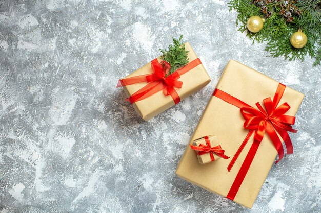 Top view christmas presents with red bows on white background