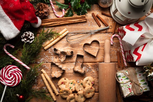 Top view christmas sweets with cooking ustensils