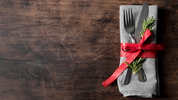 Top view christmas tableware arrangement with copy space