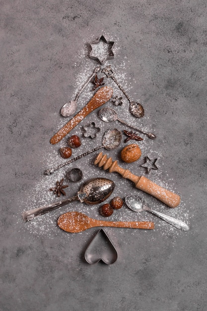 Top view of christmas tree shape made of kitchen utensils