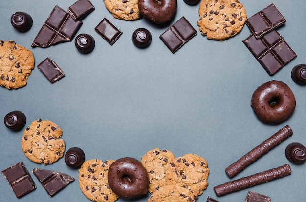 Top view circular frame with chocolate candies