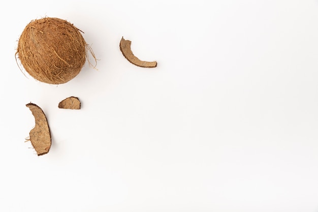 Free photo top view of coconut with shell and copy space