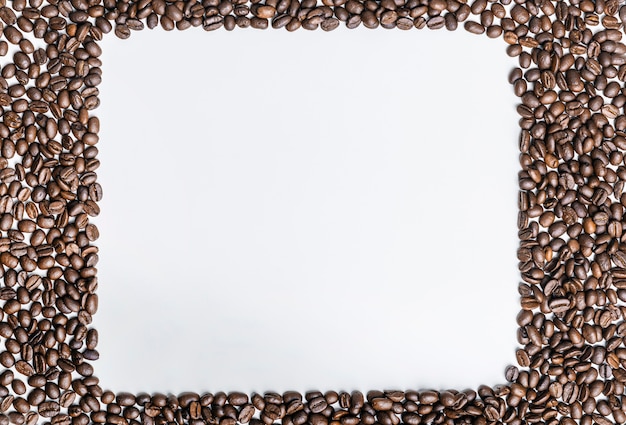 Top view of coffee beans with copy space