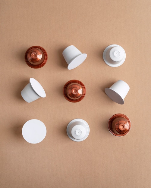 Free photo top view coffee capsules