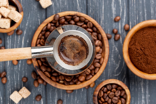 Top view of coffee concept with wooden table