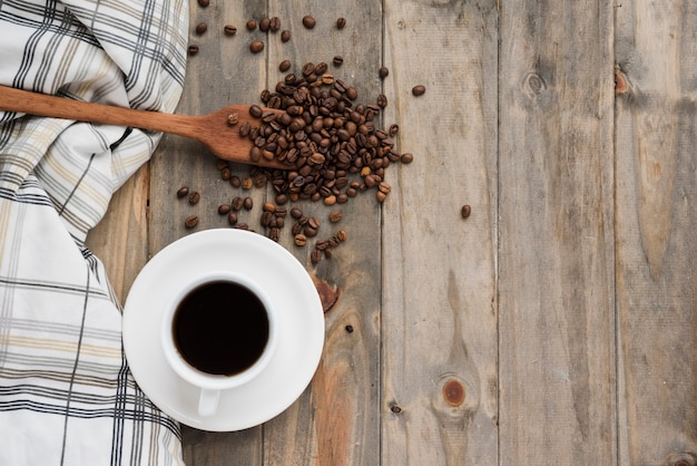 Top view coffee cup on wooden background