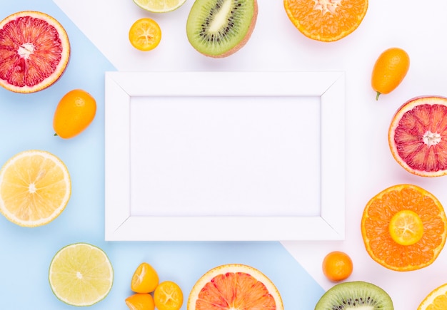 Free photo top view collection of fresh fruits with frame