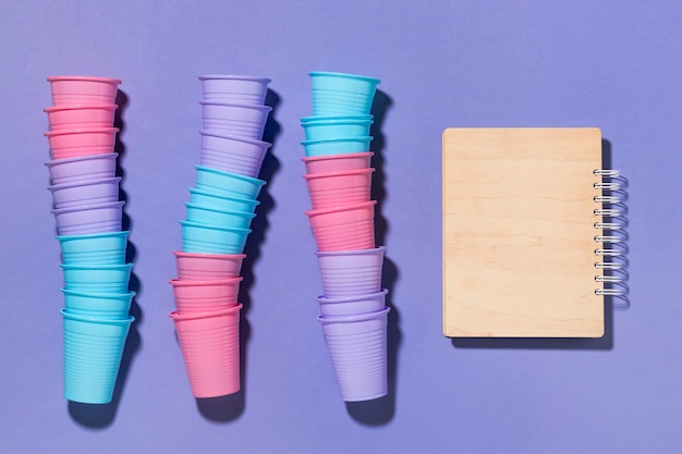 Top view collection of plastic cups on the table