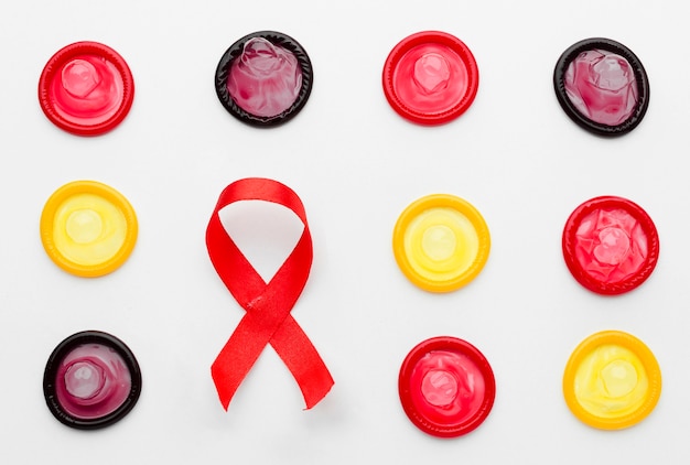 Free photo top view colorful condoms on white background